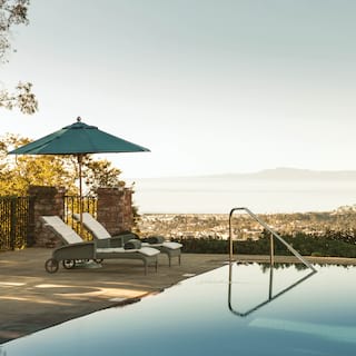 The hotel’s infinity edge swimming pool enhances the sunny views across Santa Barbara to the ocean beyond